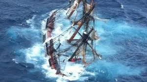 Photograph of vessel sinking.