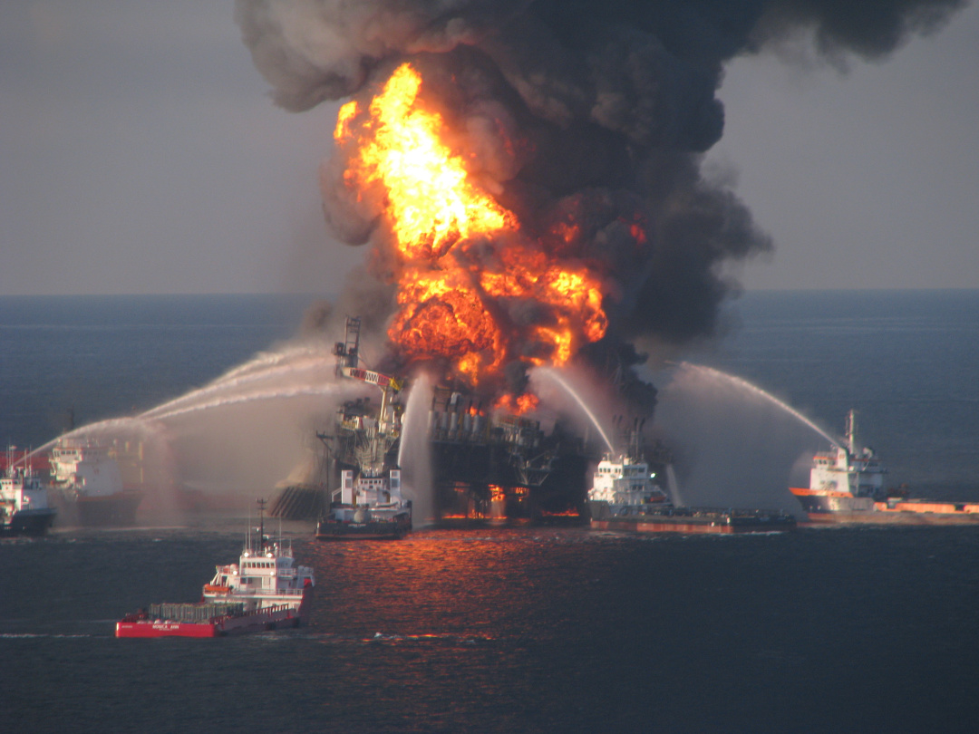 Photo of DEEPWATER HORIZON on fire with Supply Boats responding