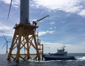 Block Island windfarm with attending CTV.