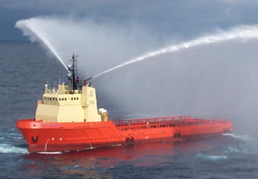 C-ENFORCER underway with water cannons flowing.