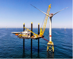 Liftboat servicing an offshore wind turbine generator Liftboat servicing an offshore wind turbine generator