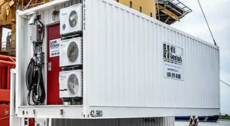 Photo of a Portable Accommodation Module (PAM) being loaded onto a vessel Photo of a Portable Accommodation Module (PAM) being loaded onto a vessel